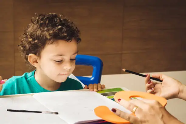 Beautiful little boy, about two years old, learning numbers.