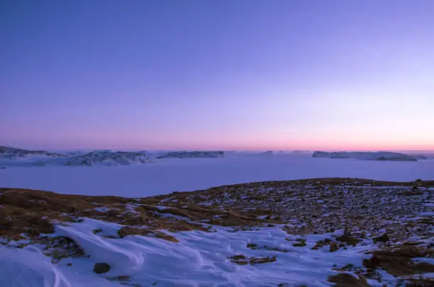 These pictures were taken at Larsemann hills at antarctica on 07-11-2017. The clear skies and the pure clarity of sky is really awesome. This picture was taken after the end of polar nights at Antarctica. There was visible mirage phenomenon and a minute view of the sun just peeping above the horizon.