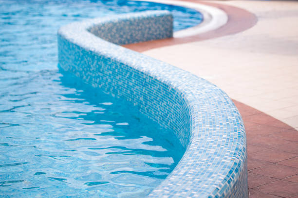 istock Beautiful curved edge of a swimming pool 828213628
