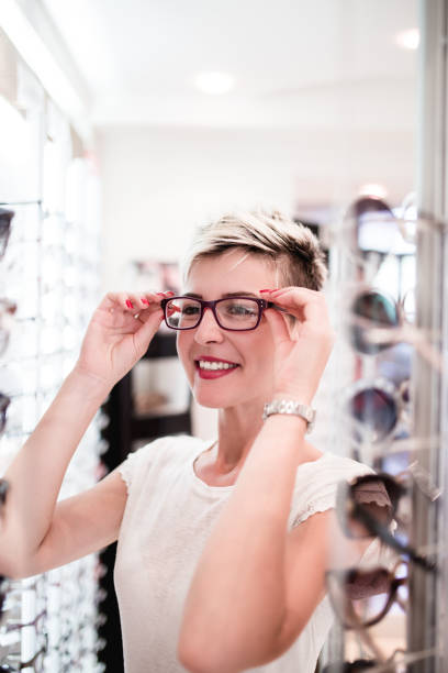 istock Woman in optical optical store 828221454