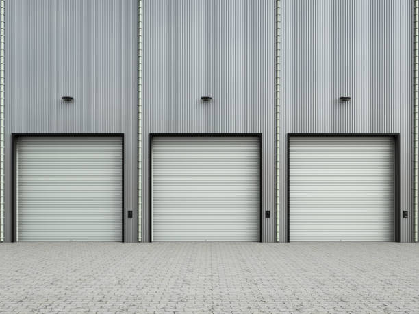 istock warehouse exterior with shutter doors 828241170