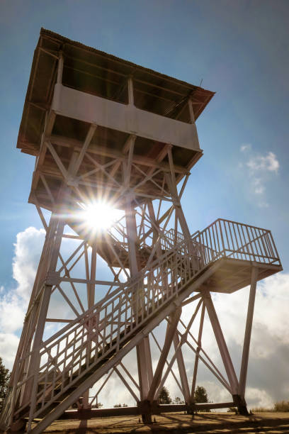 istock View point tower at Poonhill (3,210 m.) tower, Nepal with sunlight 828248462