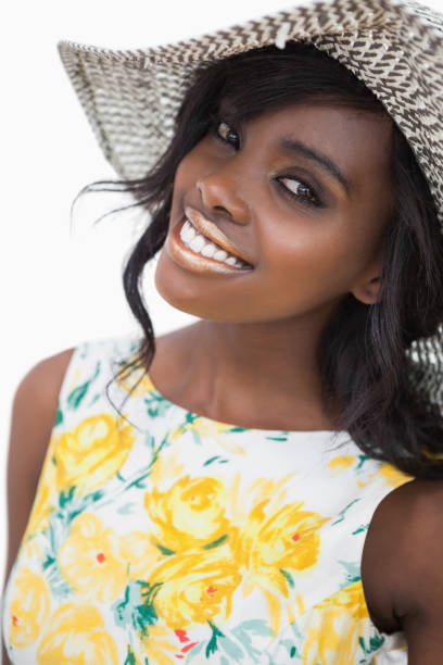 istock Woman standing wearing a summer hat 828256896