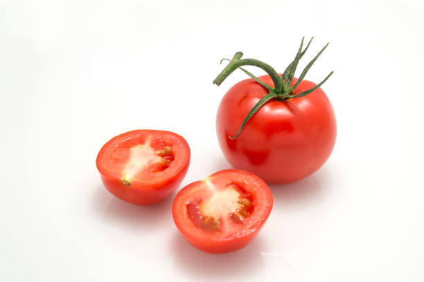 Fresh tomatoes on white background. stock photo
