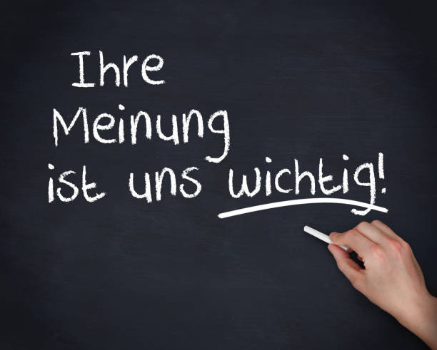 istock Hand writing Your opinion is important to us 828284200