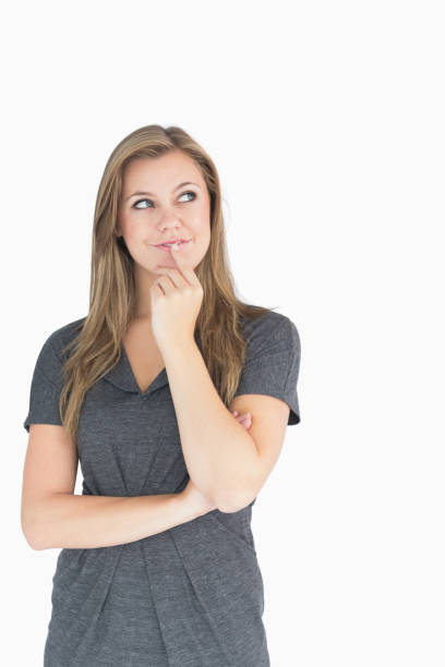 istock Blonde woman thinking 828286608