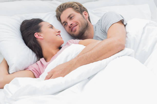 istock Couple embracing and looking at each other 828306358