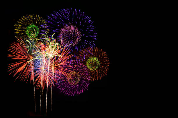 istock Colorful fireworks celebration and the city night light background. 828317916