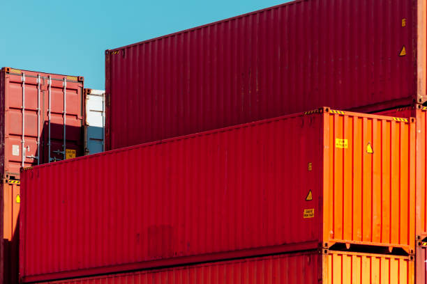 istock Several red containers stacked in a port 828323510