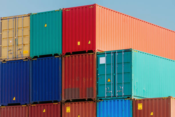 istock Several colorful containers stacked in a port 828325624