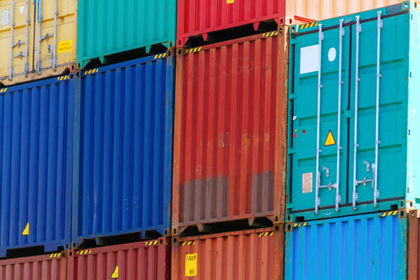 istock Several colorful containers stacked in a port 828326042