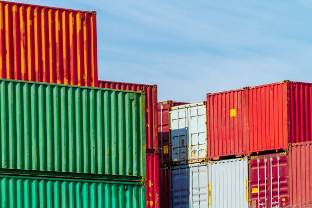 istock Several colorful containers stacked in a port 828327024