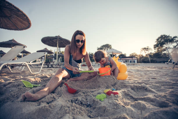 istock Playing in the sand on holiday 828327254