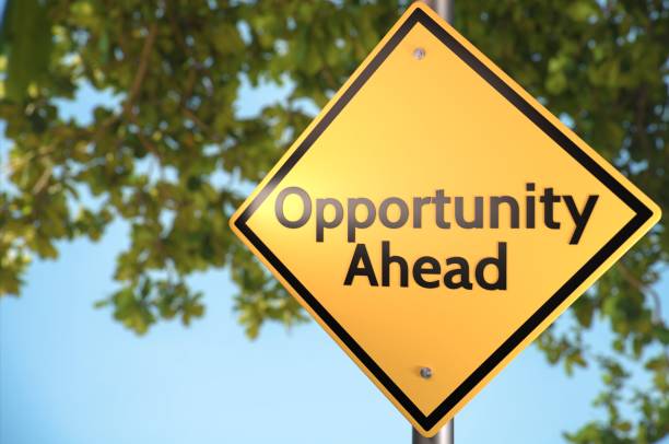 Possbile Opportunities Ahead. Road sign theme concepts - Opportunities. stock market and exchange photos stock pictures, royalty-free photos & images