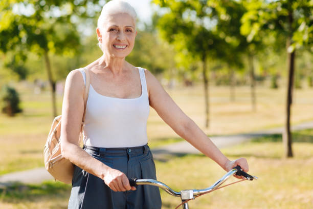 istock Positive delighted woman going for a walk 828361572