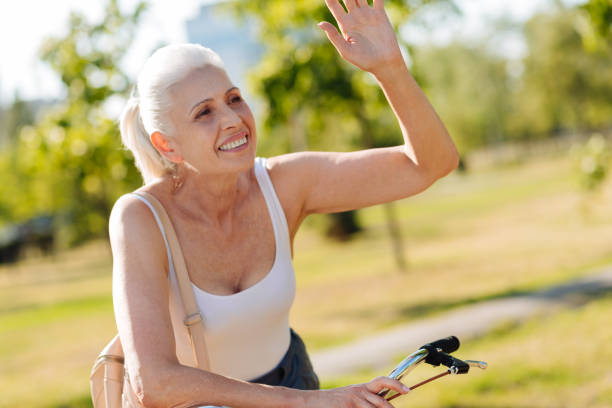 istock Attractive female raising her left hand 828363928