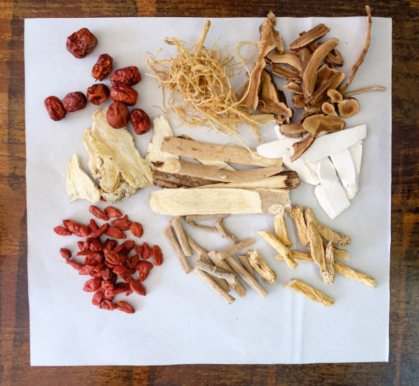 istock chinese herbal medicines on white paper 828369236
