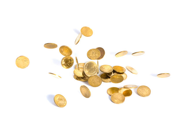 istock Falling gold coins. Money on a white background. shallow focus. 828381098