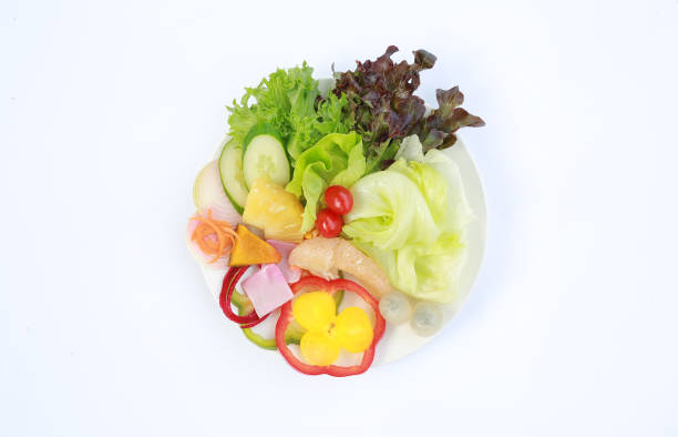 istock Vegetable salad on white background, Healthy food. Top view. 828389382