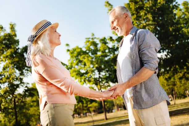 istock Delighted couple standing opposite each other 828393080
