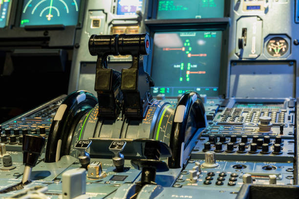 istock Airplan control stick in side pilot cockpit. Engine lever in the cockpit of an airliner 828399360