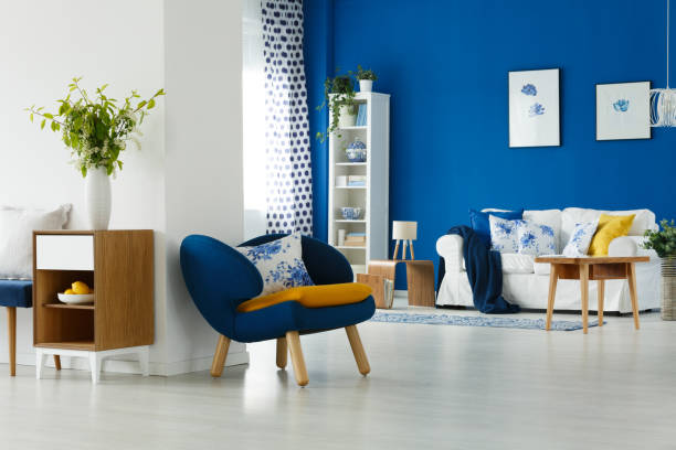 istock Armchair by the wall 828412058