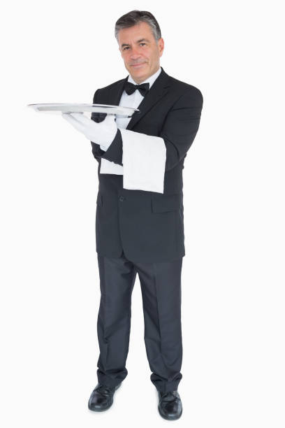 istock Happy waiter with silver tray and towel 828413484