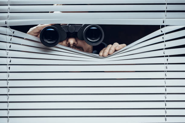 Spy Spy at work. Man with binoculars. searching binoculars stock pictures, royalty-free photos & images