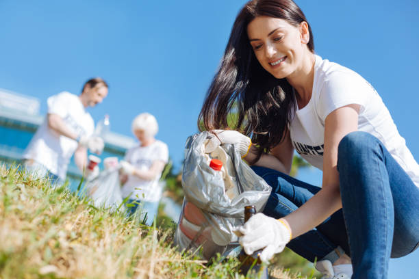 istock Admirable hardworking woman trying improving local ecology 828420208