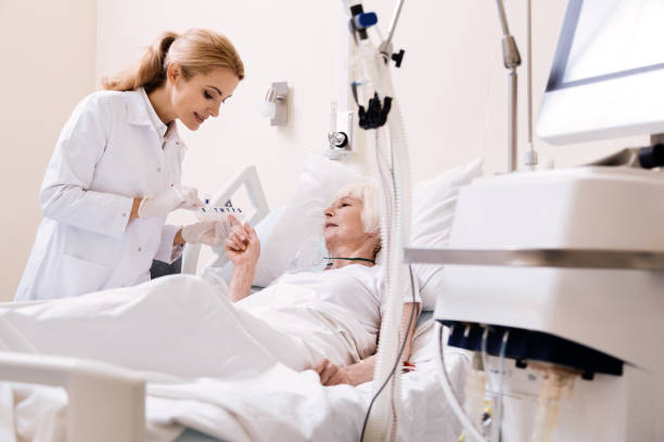 istock Aged bright woman specifying some details of her treatment 828420402