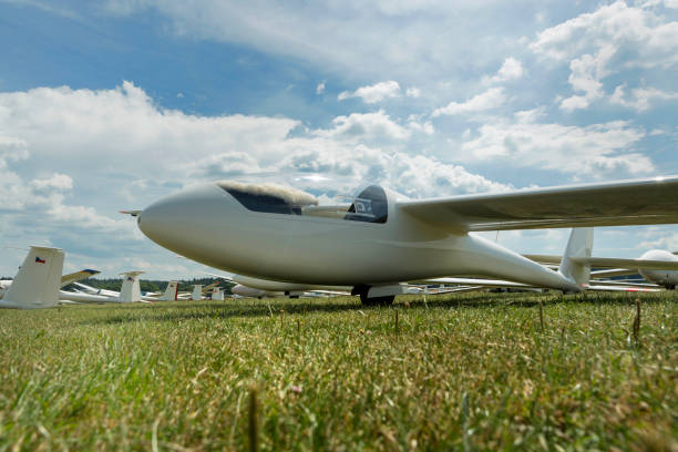 istock gliders at green airfield with blue sky 828423950