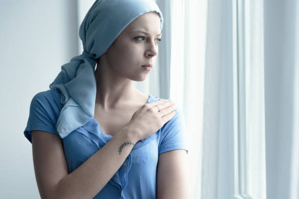 istock Cancer patient holding arm 828424104