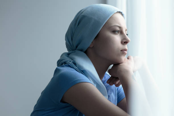 istock Cancer survivor in a scarf 828424172