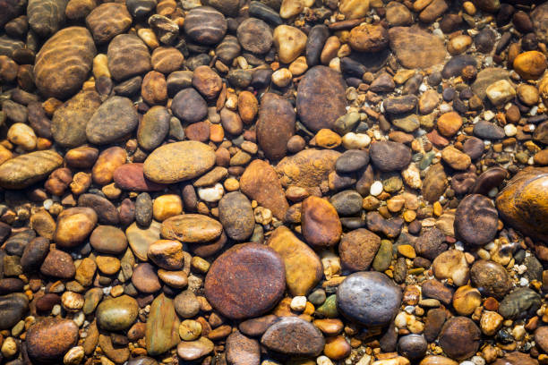 istock Natural river stone in clear river water 828425734