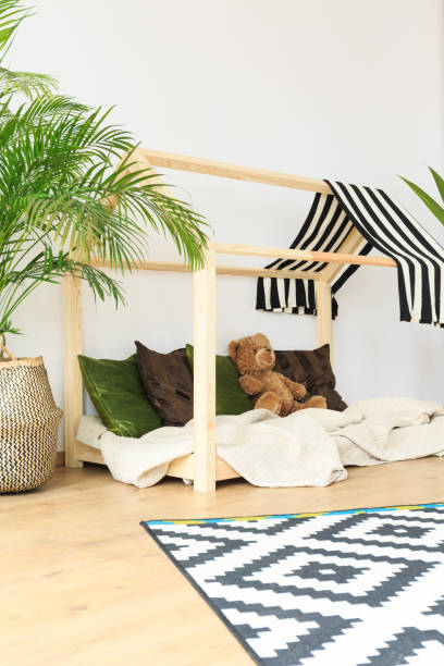 istock Wooden house in room 828428402