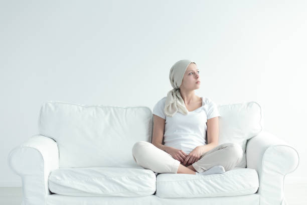 istock Girl with tumor contemplating 828428670