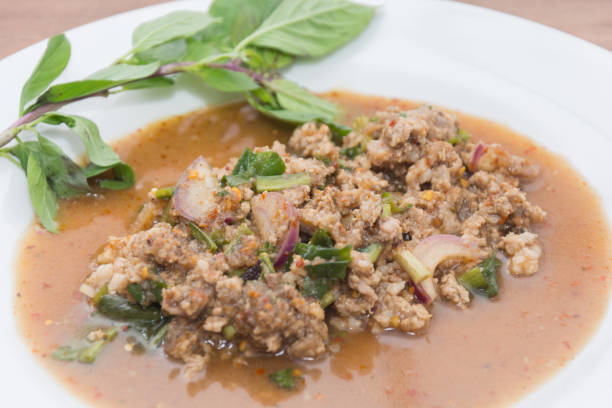 istock Spicy minced pork salad on plate 828437300