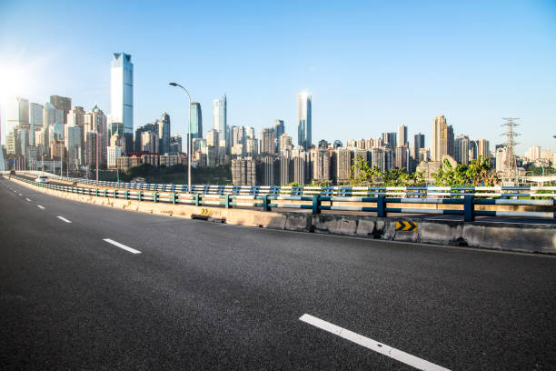 istock long empty footpath in modern city square with skyline 828441234
