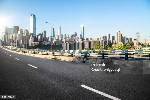 Long Empty Footpath In Modern City Square With Skyline Stock Photo - Download Image Now