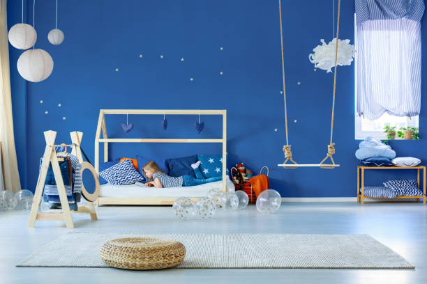 istock Girl reading in bedroom 828441340