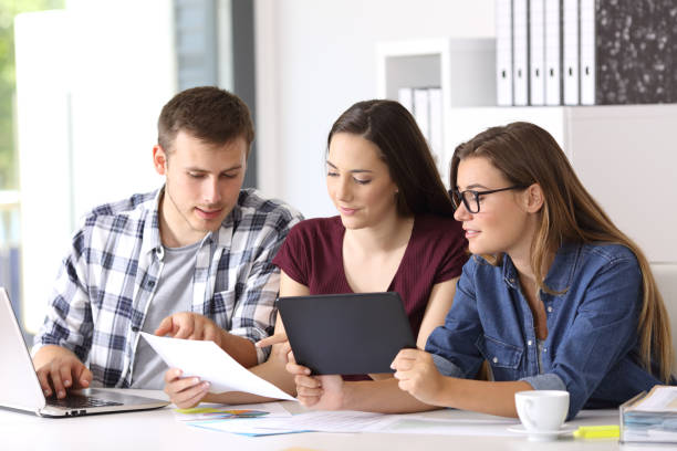 istock Employees coworking on line at office 828444156