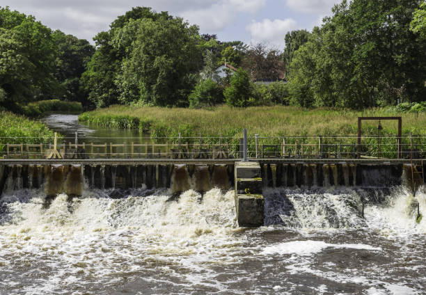 istock Foamy water flowing through sluice 828444798