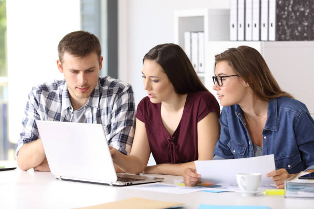 istock Entrepreneurs coworking at office 828444922
