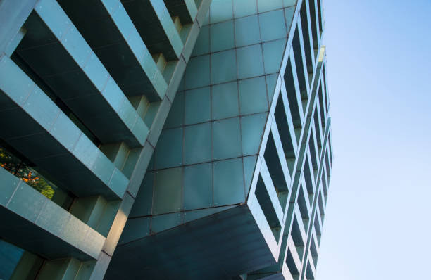 istock Looking up at business buildings 828448020