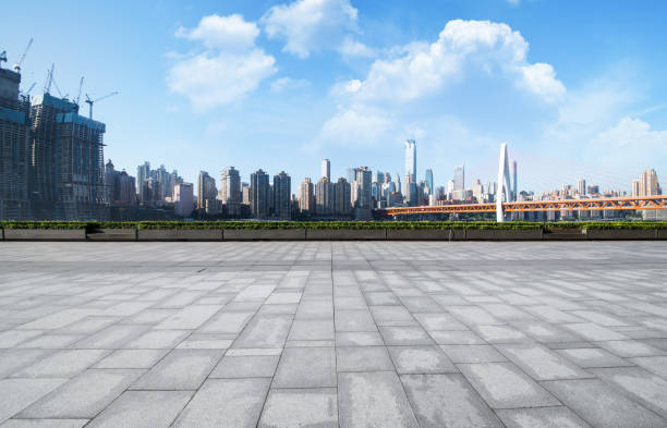 istock Panoramic skyline and buildings with empty concrete square floor 828452786