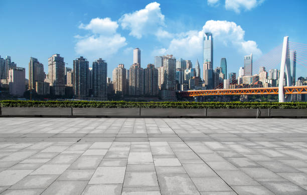 istock Panoramic skyline and buildings with empty concrete square floor 828452788