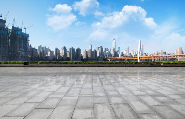 istock Panoramic skyline and buildings with empty concrete square floor 828452916