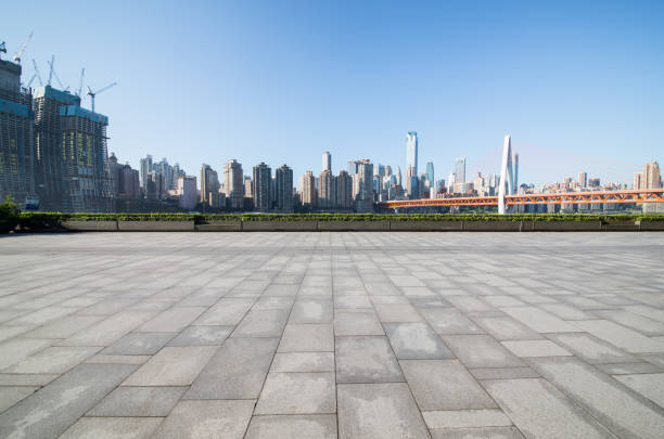 istock Panoramic skyline and buildings with empty concrete square floor 828452966