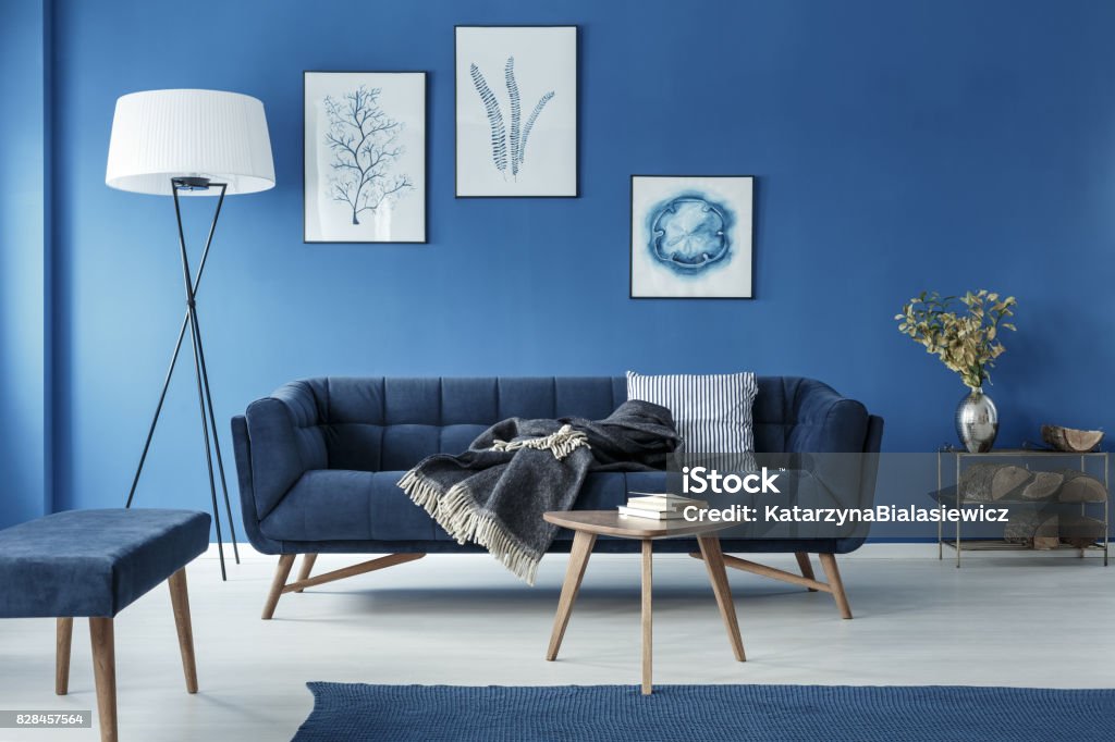 Blue living room Blue stylish elegant retro living room with sofa Blue Stock Photo