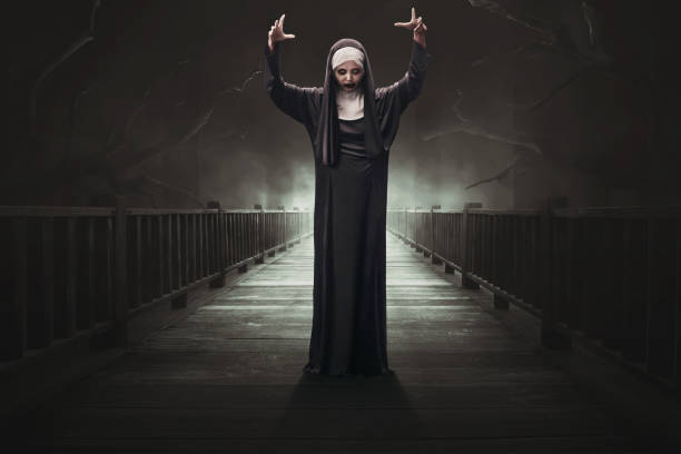 Scary asian woman devil nun Scary asian woman devil nun on the dark forest angry nun stock pictures, royalty-free photos & images